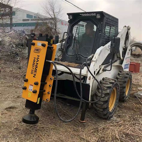 skid steer with post driver|hyd post driver for a skid steer loader.